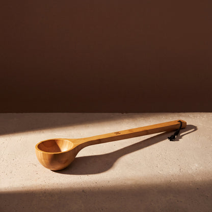 Rento Wooden Sauna Ladle - heat treated bamboo - lifestyle in sunlight