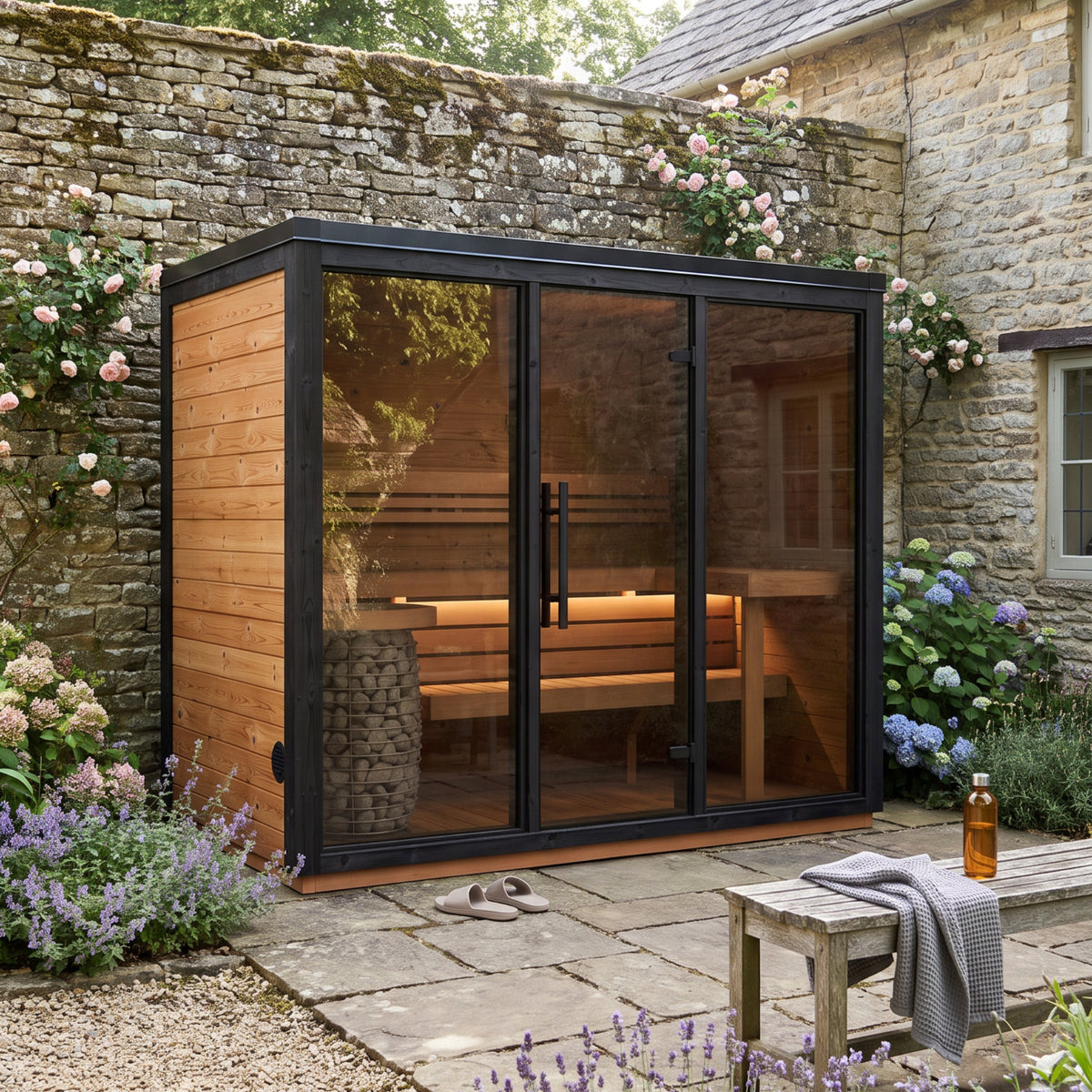 Fjelda Large outdoor sauna with a three-panel bronze tinted glazed front