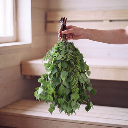 Sauna Whisk Birch & Juniper - held in the sauna