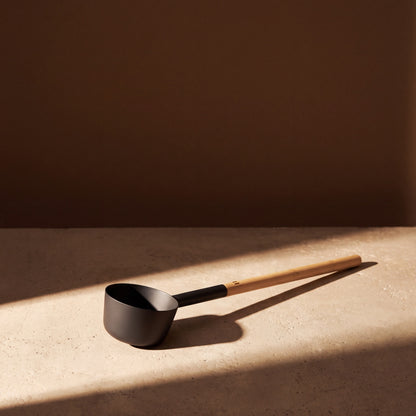 Rento Anodised Aluminium Commercial Sauna Ladle in Dark Grey (Extra Long) - lifestyle in sunlight