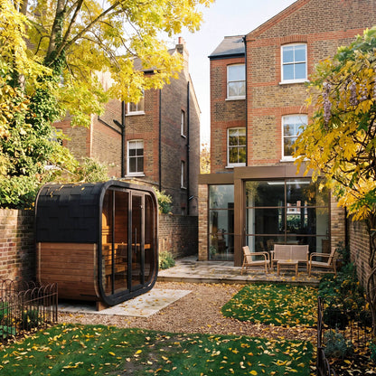 Ralva Large rounded outdoor sauna sited in the corner of a period townhouse garden