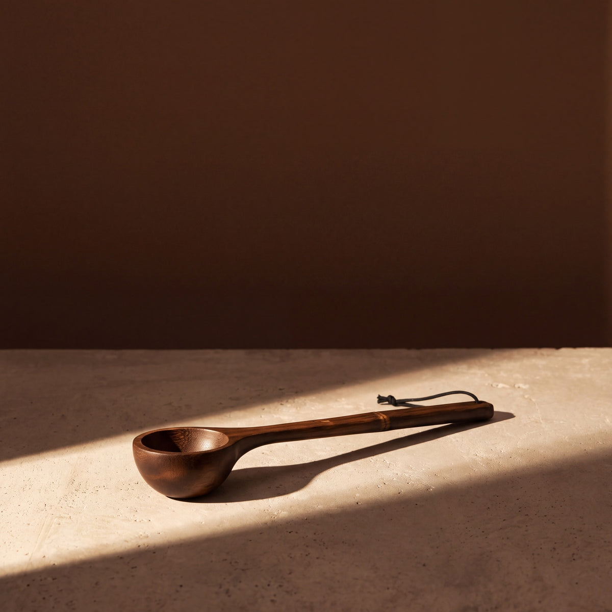 Bamboo Ladle Dark by Rento - lifestyle in sunlight