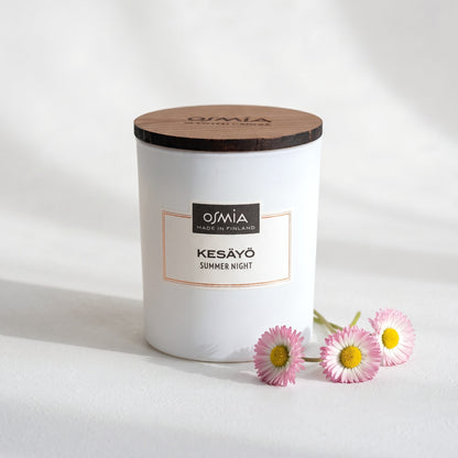 Summer Night Scented Candle by Osmia with pink daisies