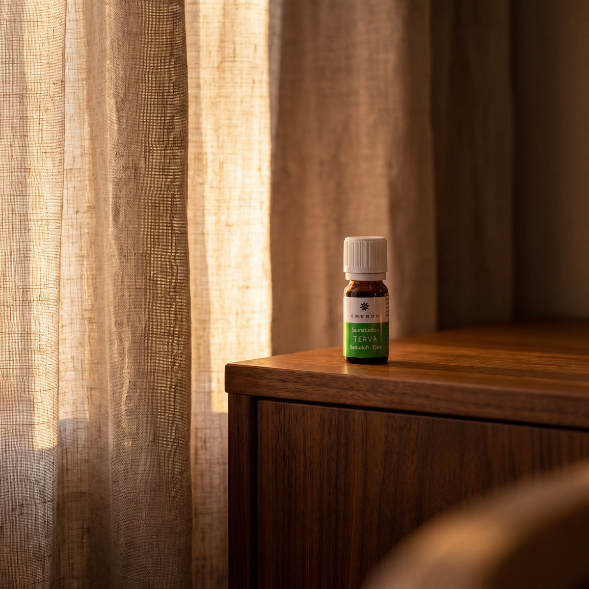 Emendo Tar Sauna Scent (10ml) - lifestyle by linen curtain