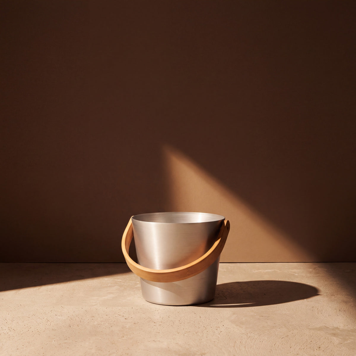 Rento 5 Litre Anodised Aluminium Sauna Bucket in Natural - lifestyle in sunlight