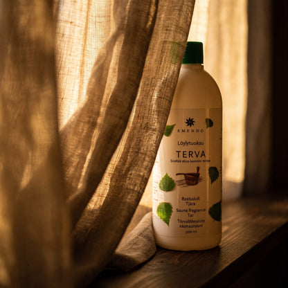Emendo Tar Sauna Scent (500ml) - lifestyle behind linen curtain