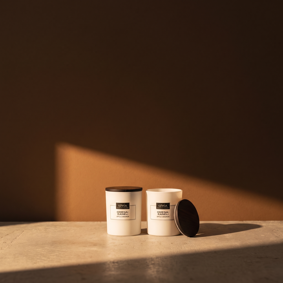 Apple-Cinnamon Scented Candle by Osmia - lifestyle in sunlight