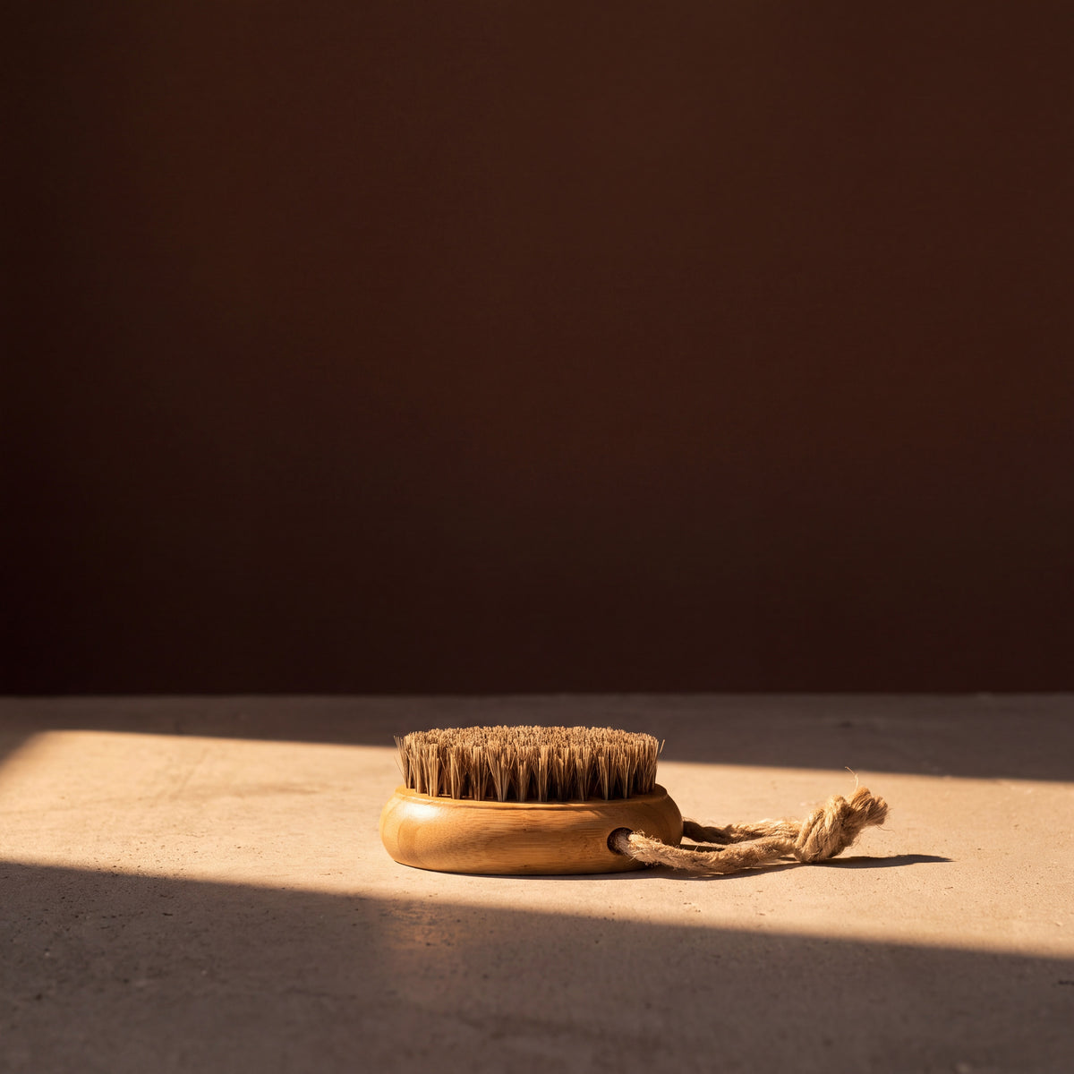 Rento Oval Wooden Nail Brush Bamboo & Natural Hair - lifestyle in sunlight